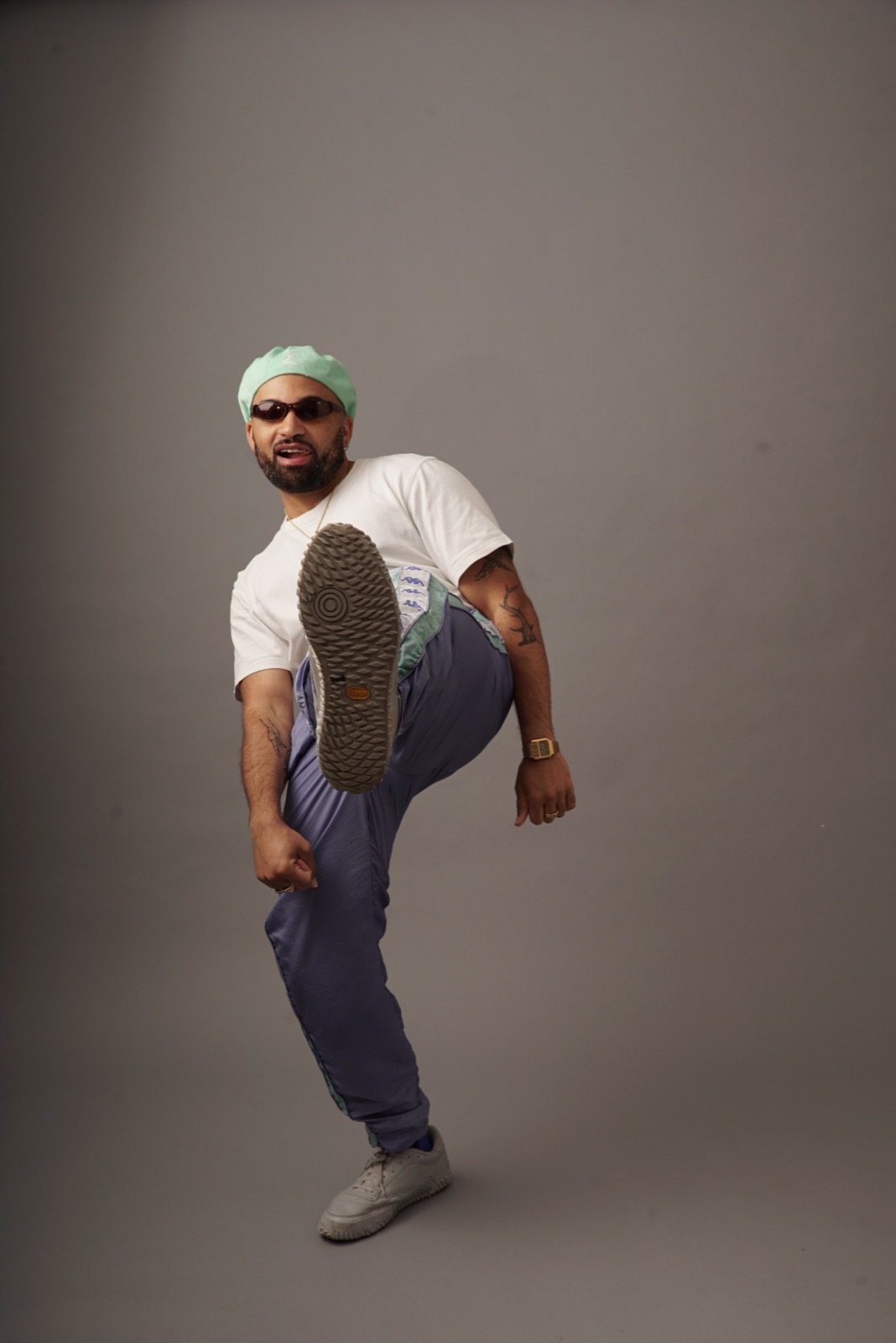 Conrad Kira full-body studio portrait