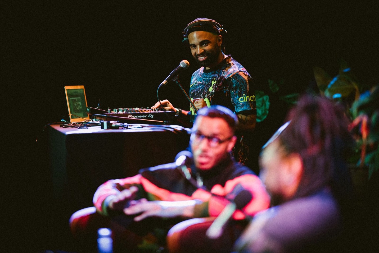 Conrad Kira DJing with audience in foreground